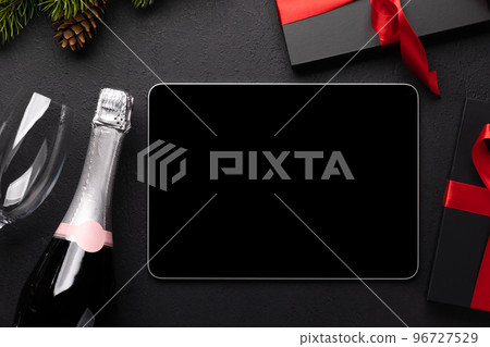 Tablet with blank screen and Christmas decor Tablet with blank screen and Christmas decor 96727529