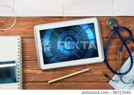 Web security and technology concept with tablet pc on wooden table 96727640