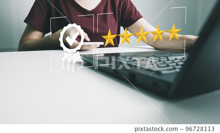 Businesswoman showing the symbol of top service 5 star quality assurance, excellent warranty, world standard, ISO certification, development and improve the quality of the organization concept. Businesswoman showing the symbol of top service 5 star quality assurance, excellent warranty, world standard, ISO certification, development and improve the quality of the organization concept. 96728113
