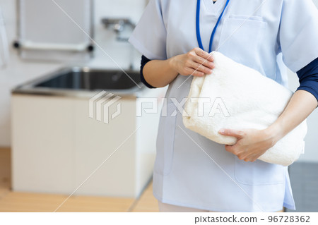 Health care workers in scrubs Health care workers in scrubs 96728362