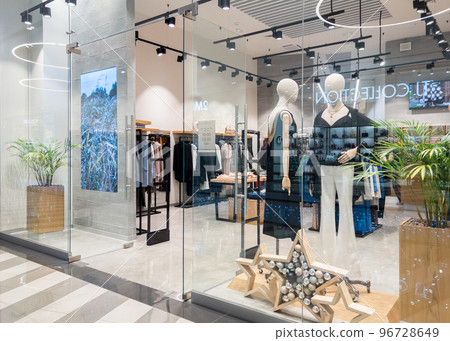 Moscow,Russia 12 11 2022 Clothes magazine shop in Paveletskaya plaza station , man, kids and women modern clothes mannequin shopping  96728649