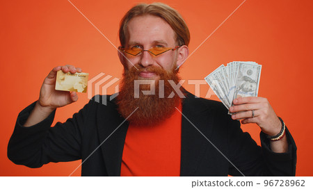 Happy man show plastic credit bank card advertising transferring money cashless, online shopping 96728962