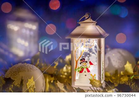 Christmas composition decorated with a lantern, Christmas balls and a garland. The dark key. New Year. Christmas composition decorated with a lantern, Christmas balls and a garland. The dark key. New Year. 96730044
