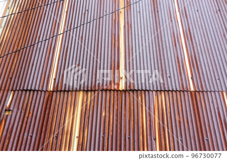 old rusty tin wall old rusty tin wall 96730077