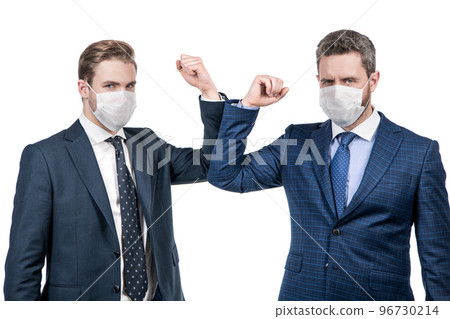 social distancing during coronavirus. boss and employee in medical mask. covid19 prevention. social distancing during coronavirus. boss and employee in medical mask. covid19 prevention. 96730214