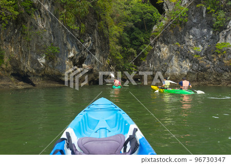 Krabi, Thailand - January 3,2019 : People kayaking at Ao tha lane mangrove forest in Krabi, Thailand on January 3,2019. Krabi, Thailand - January 3,2019 : People kayaking at Ao tha lane mangrove forest in Krabi, Thailand on January 3,2019. 96730347