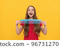 hairdresser. girl has wavy hairdo hold hairbrush. teen beauty hairstyle. portrait of frizz child 96731270