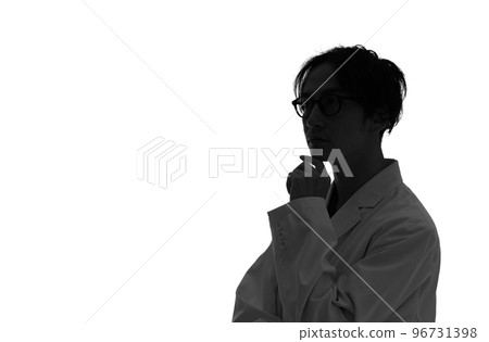 Profile silhouette of a man in a white coat thinking Profile silhouette of a man in a white coat thinking 96731398