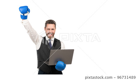 happy man in boxing gloves hold laptop isolated on white background, copy space, championship. 96731489