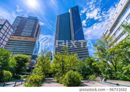 The cityscape of Tokyo in Japan, overlooking the promenade full of greenery in front of Tameike-Sanno Station and the Akasaka Intercity AIR 96731682