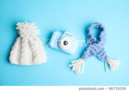 Flat lay composition with toy camera on light blue background. Future photographer Flat lay composition with toy camera on light blue background. Future photographer 96733039