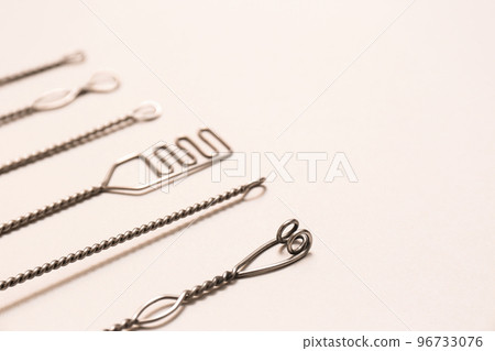 Set of logopedic probes for speech therapy on beige background. Space for text 96733076