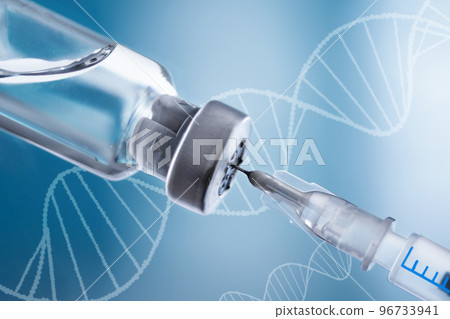 Glass vial and syringe with injection over blue background. Vaccination or beauty therapy concept. Glass vial and syringe with injection over blue background. Vaccination or beauty therapy concept. 96733941