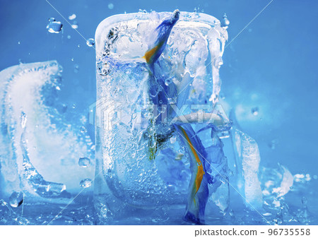 Background of iris flower in ice cube with air bubbles. Consept for spring card Background of iris flower in ice cube with air bubbles. Consept for spring card 96735558