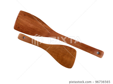 Two wooden kitchen spatulas isolated on a white background. 96736565