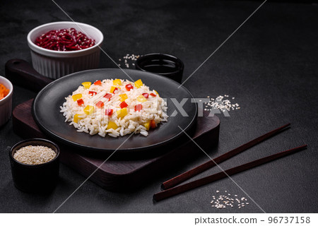 Tasty Asian dish of rice, pepper, spices and herbs 96737158