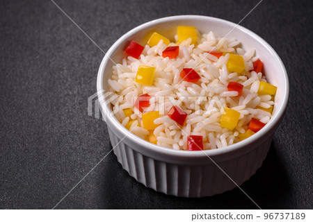 Tasty Asian dish of rice, pepper, spices and herbs 96737189