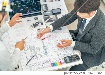 First-class architect drawing meeting construction site construction supervisor design discussion site regular meeting 96737364