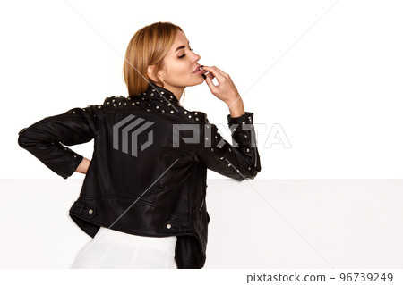 fashionable blonde woman in black leather jacket fashionable blonde woman in black leather jacket 96739249