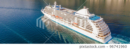 BANNER, LONG FORMAT Luxury passenger liner in the bay of Kotor with travel returning after the Covid 19 pandemic Portrait of a disgruntled girl sitting at a cafe table 96741960