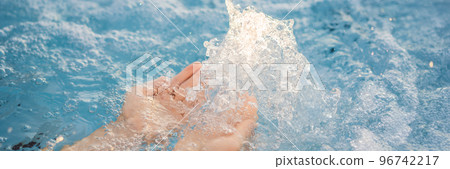 BANNER, LONG FORMAT Portrait of young carefree happy smiling woman relaxing at hot tub during enjoying happy traveling moment vacation life against the background of green big mountains BANNER, LONG FORMAT Portrait of young carefree happy smiling woman relaxing at hot tub during enjoying happy traveling moment vacation life against the background of green big mountains 96742217