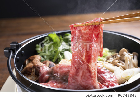 Sukiyaki cooking 96743845