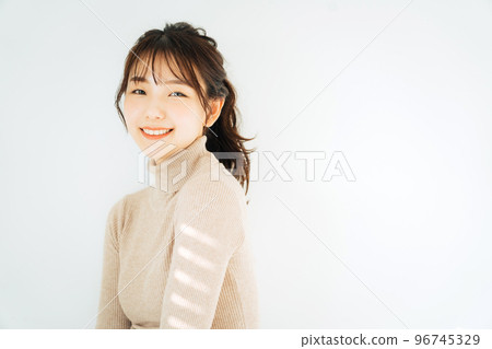 woman wearing turtleneck knit woman wearing turtleneck knit 96745329