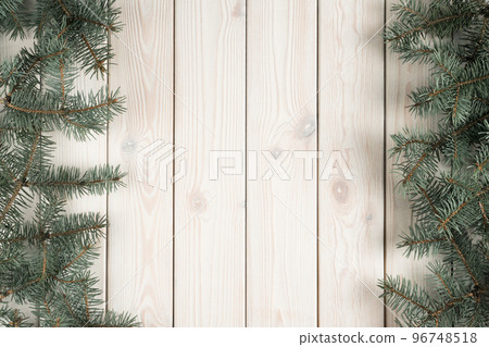 Christmas greeting wallpaper banner with evergreen tree branch decoration and wooden space in center. Background, mockup Christmas greeting wallpaper banner with evergreen tree branch decoration and wooden space in center. Background, mockup 96748518