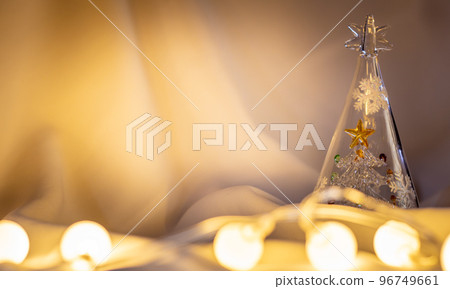 glass christmas tree and garland lights 96749661
