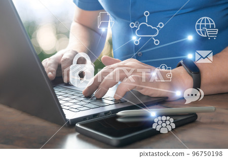 cyber security. Business, technology, internet and networking concept. businessman working on his laptop in office, select icon security on virtual display 96750198