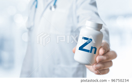 Zinc Zn , Zn supplements for human health. Doctor recommends taking Zinc. doctor talks about Benefits of Zn. Essential vitamins and minerals for humans. Zinc Health Concept. 96750234