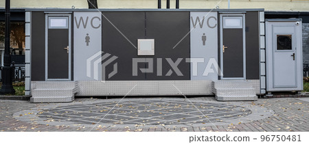 modern outdoor toilet. modern public toilet exterior outdoor. Modern Toilet metal building, outdoor, day time. Facade of outdoor lavatory with men women WC sign modern outdoor toilet. modern public toilet exterior outdoor. Modern Toilet metal building, outdoor, day time. Facade of outdoor lavatory with men women WC sign 96750481