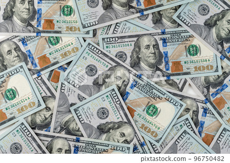 pile of one hundred US banknotes. Cash of hundred dollar bills, dollar background image. 100 bills background pile of one hundred US banknotes. Cash of hundred dollar bills, dollar background image. 100 bills background 96750482