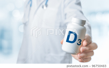 Doctor recommends taking vitamin D. Essential vitamins and minerals for humans. doctor gives vitamin D3. D alphabet Bottles with vitamins and dietary supplement Doctor recommends taking vitamin D. Essential vitamins and minerals for humans. doctor gives vitamin D3. D alphabet Bottles with vitamins and dietary supplement 96750483