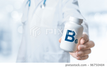 B6 Vitamin, B6 supplements for human health. Doctor recommends taking vitamin B. doctor talks about Benefits of B. Essential vitamins and minerals for humans. B6 Health Concept. 96750484