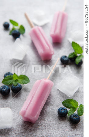 Homemade blueberry ice cream or popsicles 96755154