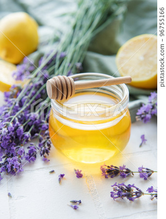 Jar with honey and fresh lavender flowers Jar with honey and fresh lavender flowers 96755166