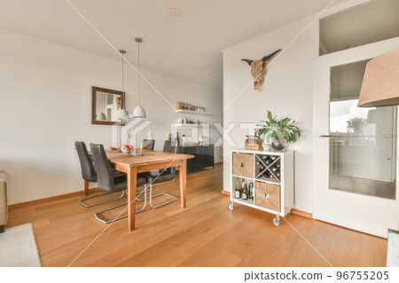 Interior of contemporary living room with comfortable sofa and wooden table in flat Interior of contemporary living room with comfortable sofa and wooden table in flat 96755205
