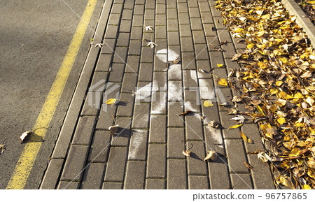 White pedestrian sign on a pedestrian road. Pedestrian sign. White pedestrian sign on a pedestrian road. Pedestrian sign. 96757865