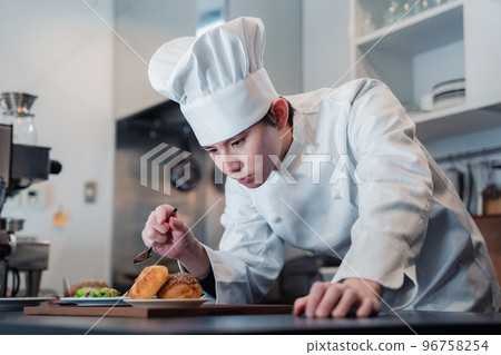 Patissier who makes discerning sweets Patissier who makes discerning sweets 96758254