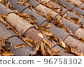 roof covered with dry leaves 96758302
