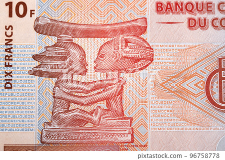 .Luba carving Tete-a-Tete from Congolese franc .Luba carving Tete-a-Tete from Congolese franc 96758778