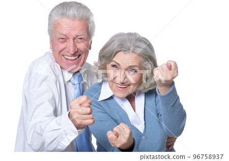 Portrait of happy senior couple gesturing 96758937