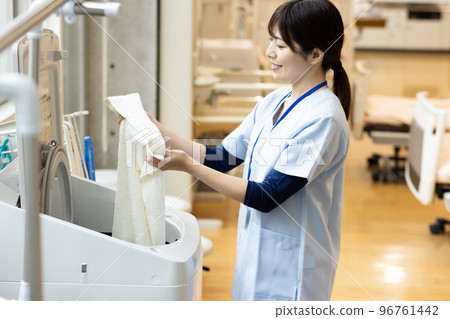 Health care workers in scrubs Health care workers in scrubs 96761442