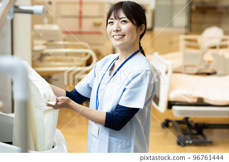 Health care workers in scrubs 96761444
