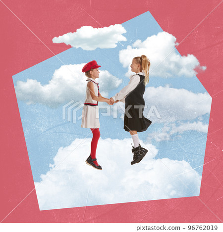 Contemporary art collage. Creative design. Stylish little girls, children having fun, playing, dancing on the cloud 96762019