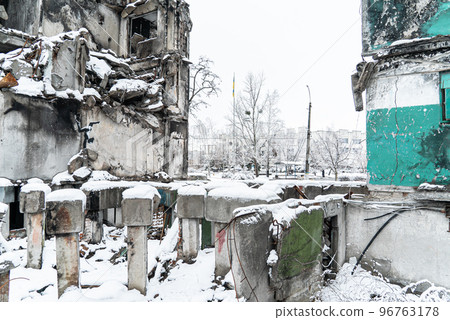 Graffiti by Banksy Gymnast Girl on the wall of a war-torn house in Borodyanka, Ukraine 96763178