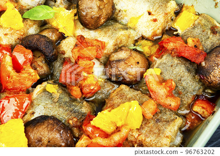 Fish prepared with mushrooms and oranges. Fish prepared with mushrooms and oranges. 96763202