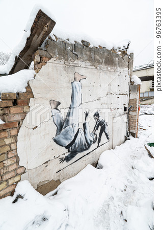 Borodyanka, Ukraine - Banksy graffiti on the wall 96763395
