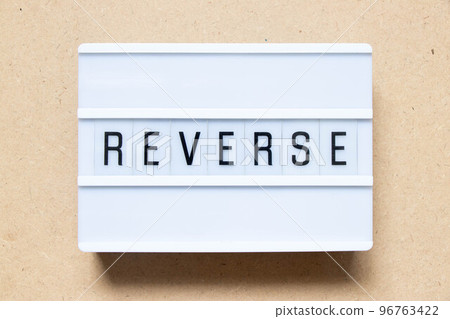 Lightbox with word reverse on wood background Lightbox with word reverse on wood background 96763422